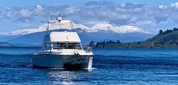 Sail into Serenity: Lake Taupo Yacht Cruise and Maori Rock Carvings Expedition