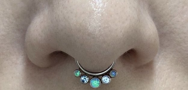 Пирсинг септум (septum).