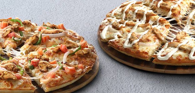 Conquer Cravings in Lahore with Domino's Delicious Deals!